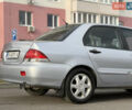 Сірий Міцубісі Lancer, об'ємом двигуна 1.3 л та пробігом 160 тис. км за 4999 $, фото 4 на Automoto.ua