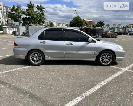 Сірий Міцубісі Lancer, об'ємом двигуна 1.58 л та пробігом 178 тис. км за 4500 $, фото 6 на Automoto.ua