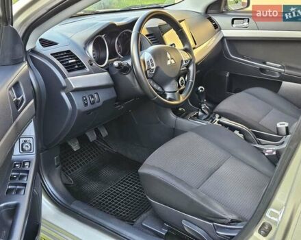 Серый Мицубиси Лансер, объемом двигателя 2 л и пробегом 282 тыс. км за 5450 $, фото 43 на Automoto.ua