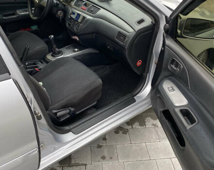 Серый Мицубиси Лансер, объемом двигателя 1.6 л и пробегом 263 тыс. км за 2350 $, фото 6 на Automoto.ua