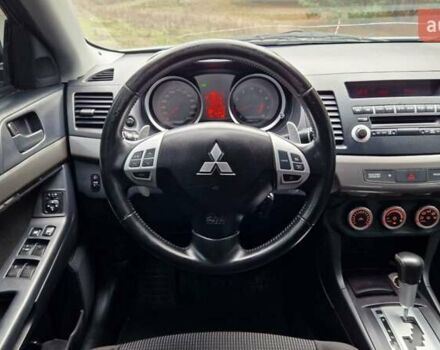 Серый Мицубиси Лансер, объемом двигателя 2 л и пробегом 213 тыс. км за 6550 $, фото 24 на Automoto.ua