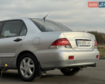 Серый Мицубиси Лансер, объемом двигателя 1.3 л и пробегом 160 тыс. км за 5555 $, фото 19 на Automoto.ua