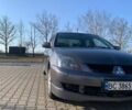 Серый Мицубиси Лансер, объемом двигателя 1.6 л и пробегом 260 тыс. км за 3950 $, фото 1 на Automoto.ua