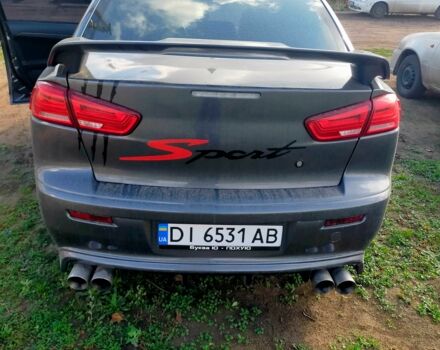 Серый Мицубиси Лансер, объемом двигателя 2 л и пробегом 351 тыс. км за 7000 $, фото 4 на Automoto.ua