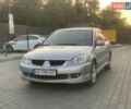 Сірий Міцубісі Lancer, об'ємом двигуна 1.58 л та пробігом 316 тис. км за 3450 $, фото 1 на Automoto.ua