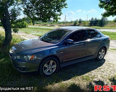 Серый Мицубиси Лансер, объемом двигателя 2 л и пробегом 236 тыс. км за 7500 $, фото 1 на Automoto.ua