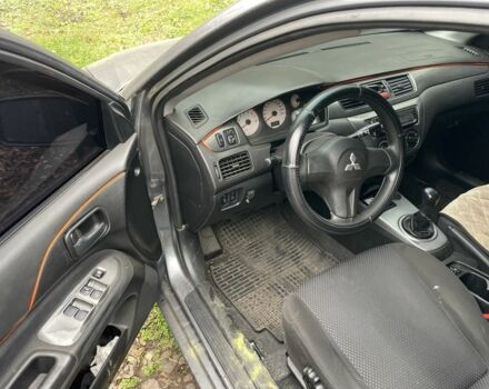 Сірий Міцубісі Lancer, об'ємом двигуна 1.6 л та пробігом 290 тис. км за 3600 $, фото 3 на Automoto.ua
