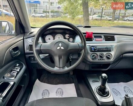 Сірий Міцубісі Lancer, об'ємом двигуна 1.58 л та пробігом 138 тис. км за 4990 $, фото 21 на Automoto.ua