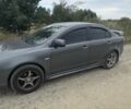 Сірий Міцубісі Lancer, об'ємом двигуна 2 л та пробігом 328 тис. км за 4999 $, фото 1 на Automoto.ua