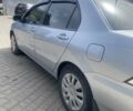 Сірий Міцубісі Lancer, об'ємом двигуна 1.6 л та пробігом 238 тис. км за 5500 $, фото 2 на Automoto.ua