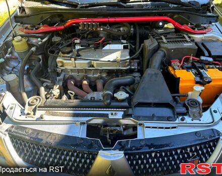 Серый Мицубиси Лансер, объемом двигателя 2 л и пробегом 300 тыс. км за 5700 $, фото 1 на Automoto.ua