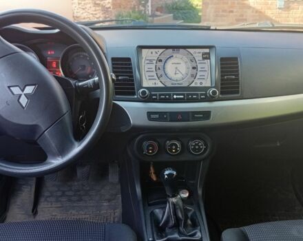 Серый Мицубиси Лансер, объемом двигателя 1.5 л и пробегом 215 тыс. км за 4999 $, фото 7 на Automoto.ua