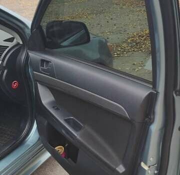 Сірий Міцубісі Lancer, об'ємом двигуна 2 л та пробігом 179 тис. км за 7700 $, фото 10 на Automoto.ua