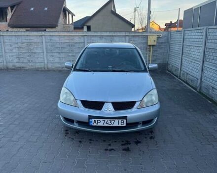 Серый Мицубиси Лансер, объемом двигателя 1.6 л и пробегом 256 тыс. км за 4500 $, фото 8 на Automoto.ua