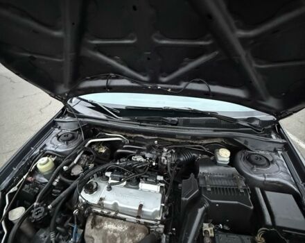 Серый Мицубиси Лансер, объемом двигателя 1.6 л и пробегом 350 тыс. км за 2850 $, фото 1 на Automoto.ua