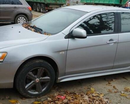 Серый Мицубиси Лансер, объемом двигателя 2 л и пробегом 305 тыс. км за 6300 $, фото 2 на Automoto.ua