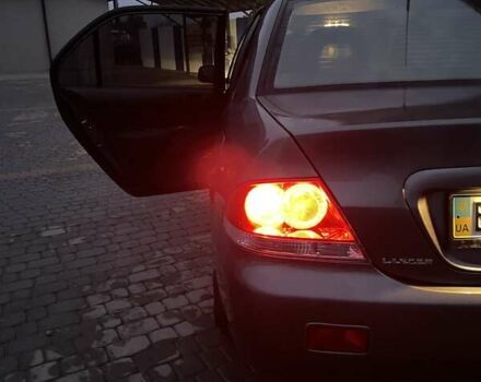 Сірий Міцубісі Lancer, об'ємом двигуна 1.6 л та пробігом 330 тис. км за 3500 $, фото 38 на Automoto.ua