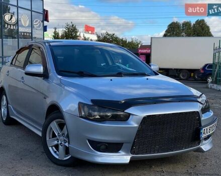 Серый Мицубиси Лансер, объемом двигателя 2 л и пробегом 150 тыс. км за 6100 $, фото 2 на Automoto.ua