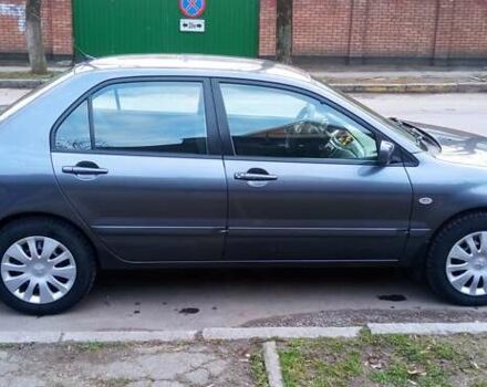 Міцубісі Lancer 2007 у Хмельницькому на Automoto.ua Сірий Міцубісі Lancer, об'ємом двигуна 1.58 л та пробігом 143 тис. км за 4100 $, фото 3 на Automoto.ua