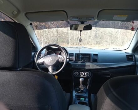 Серый Мицубиси Лансер, объемом двигателя 2 л и пробегом 180 тыс. км за 5800 $, фото 11 на Automoto.ua