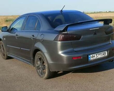 Сірий Міцубісі Lancer, об'ємом двигуна 2 л та пробігом 240 тис. км за 9500 $, фото 8 на Automoto.ua