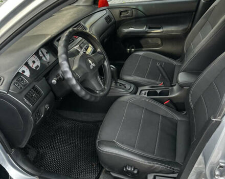 Серый Мицубиси Лансер, объемом двигателя 1.6 л и пробегом 200 тыс. км за 3900 $, фото 8 на Automoto.ua