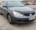 Сірий Міцубісі Lancer, об'ємом двигуна 1.6 л та пробігом 270 тис. км за 4300 $, фото 1 на Automoto.ua