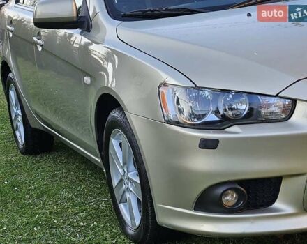 Серый Мицубиси Лансер, объемом двигателя 2 л и пробегом 282 тыс. км за 5450 $, фото 16 на Automoto.ua