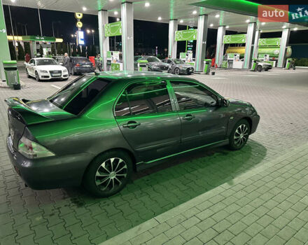 Серый Мицубиси Лансер, объемом двигателя 1.6 л и пробегом 112 тыс. км за 2800 $, фото 7 на Automoto.ua