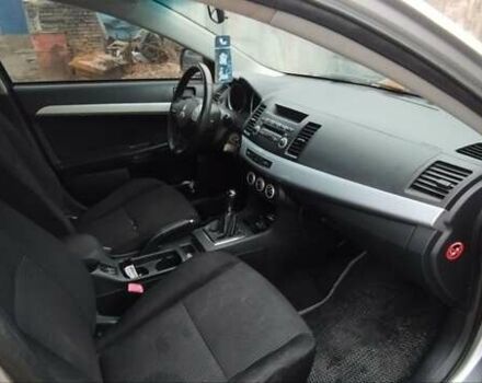 Серый Мицубиси Лансер, объемом двигателя 2 л и пробегом 305 тыс. км за 6300 $, фото 5 на Automoto.ua