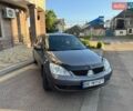 Серый Мицубиси Лансер, объемом двигателя 1.6 л и пробегом 244 тыс. км за 4400 $, фото 1 на Automoto.ua
