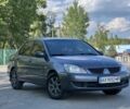 Сірий Міцубісі Lancer, об'ємом двигуна 0.16 л та пробігом 250 тис. км за 4350 $, фото 3 на Automoto.ua