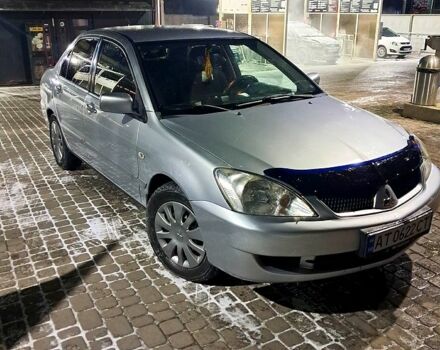 Сірий Міцубісі Lancer, об'ємом двигуна 1.6 л та пробігом 244 тис. км за 3900 $, фото 1 на Automoto.ua