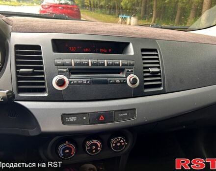 Серый Мицубиси Лансер, объемом двигателя 1.5 л и пробегом 260 тыс. км за 6100 $, фото 11 на Automoto.ua