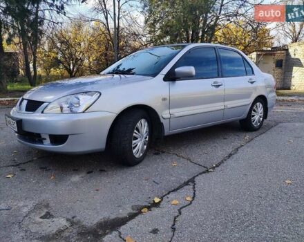 Сірий Міцубісі Lancer, об'ємом двигуна 1.58 л та пробігом 122 тис. км за 6300 $, фото 6 на Automoto.ua