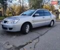 Сірий Міцубісі Lancer, об'ємом двигуна 1.58 л та пробігом 122 тис. км за 6300 $, фото 6 на Automoto.ua