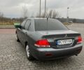 Сірий Міцубісі Lancer, об'ємом двигуна 1.6 л та пробігом 253 тис. км за 3100 $, фото 3 на Automoto.ua