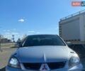 Серый Мицубиси Лансер, объемом двигателя 2 л и пробегом 320 тыс. км за 4300 $, фото 1 на Automoto.ua