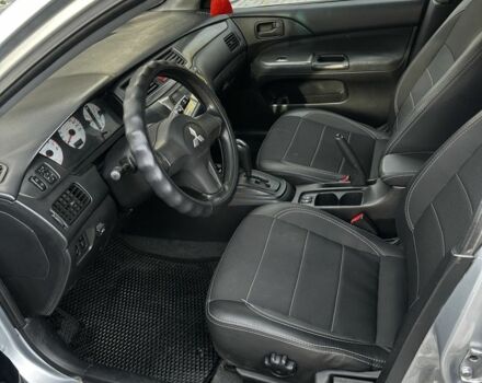 Сірий Міцубісі Lancer, об'ємом двигуна 1.6 л та пробігом 200 тис. км за 3900 $, фото 8 на Automoto.ua