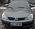 Сірий Міцубісі Lancer, об'ємом двигуна 1.58 л та пробігом 218 тис. км за 4700 $, фото 1 на Automoto.ua