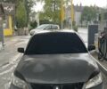 Серый Мицубиси Лансер, объемом двигателя 1.6 л и пробегом 175 тыс. км за 4500 $, фото 1 на Automoto.ua