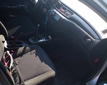 Серый Мицубиси Лансер, объемом двигателя 1.6 л и пробегом 210 тыс. км за 3500 $, фото 7 на Automoto.ua