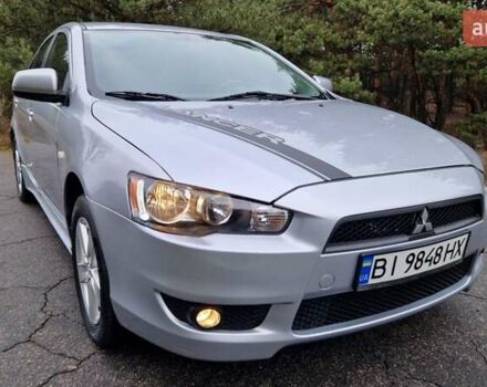 Серый Мицубиси Лансер, объемом двигателя 2 л и пробегом 213 тыс. км за 6550 $, фото 6 на Automoto.ua