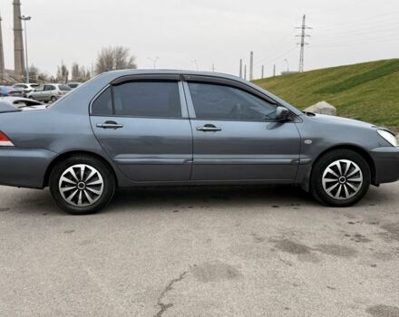 Сірий Міцубісі Lancer, об'ємом двигуна 1.6 л та пробігом 270 тис. км за 4300 $, фото 2 на Automoto.ua