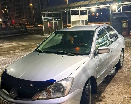 Сірий Міцубісі Lancer, об'ємом двигуна 1.6 л та пробігом 244 тис. км за 3900 $, фото 6 на Automoto.ua