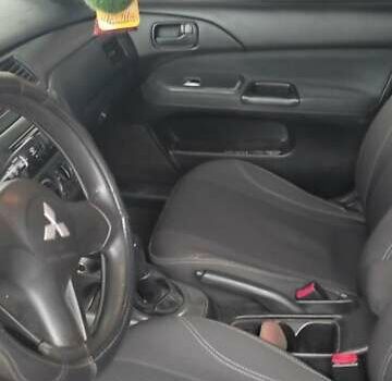 Серый Мицубиси Лансер, объемом двигателя 1.58 л и пробегом 400 тыс. км за 5000 $, фото 7 на Automoto.ua