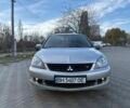 Сірий Міцубісі Lancer, об'ємом двигуна 2 л та пробігом 184 тис. км за 4200 $, фото 1 на Automoto.ua