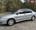 Серый Мицубиси Лансер, объемом двигателя 1.6 л и пробегом 200 тыс. км за 4400 $, фото 1 на Automoto.ua