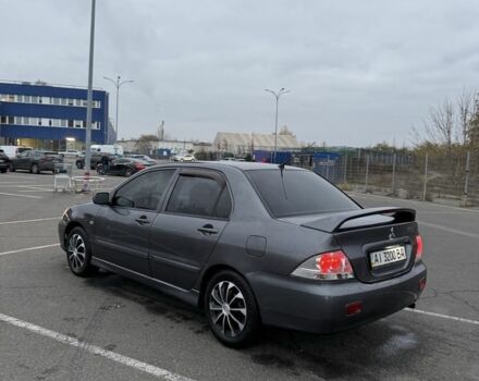 Серый Мицубиси Лансер, объемом двигателя 1.6 л и пробегом 350 тыс. км за 2850 $, фото 6 на Automoto.ua