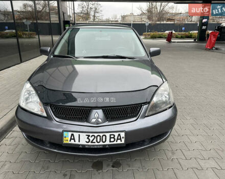 Сірий Міцубісі Lancer, об'ємом двигуна 1.6 л та пробігом 115 тис. км за 2800 $, фото 7 на Automoto.ua
